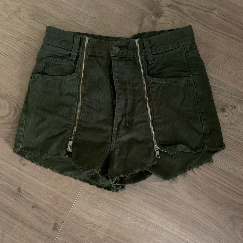 Green high waisted jean shorts with zipper accent